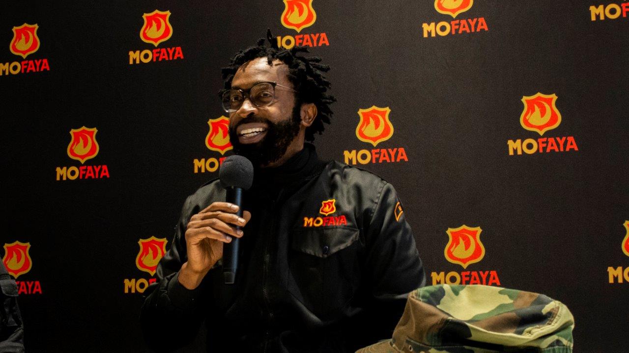DJ Sbu talking about Mofaya at an event.